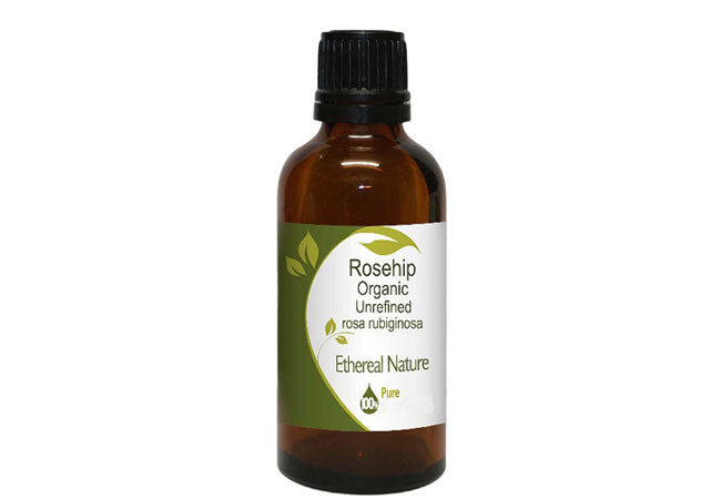 Natural organic rosehip oil unrefined in a glass bottle with a dropper