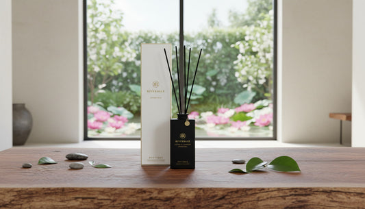 Lotus & Jasmine premium reed diffuser with 140ml matte black glass bottle and gold details